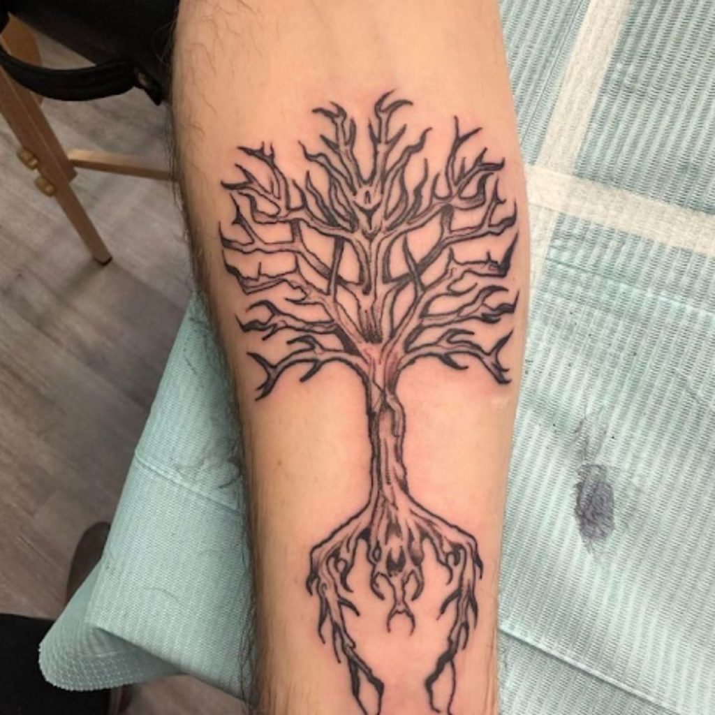Rebellious Tree Tattoo
