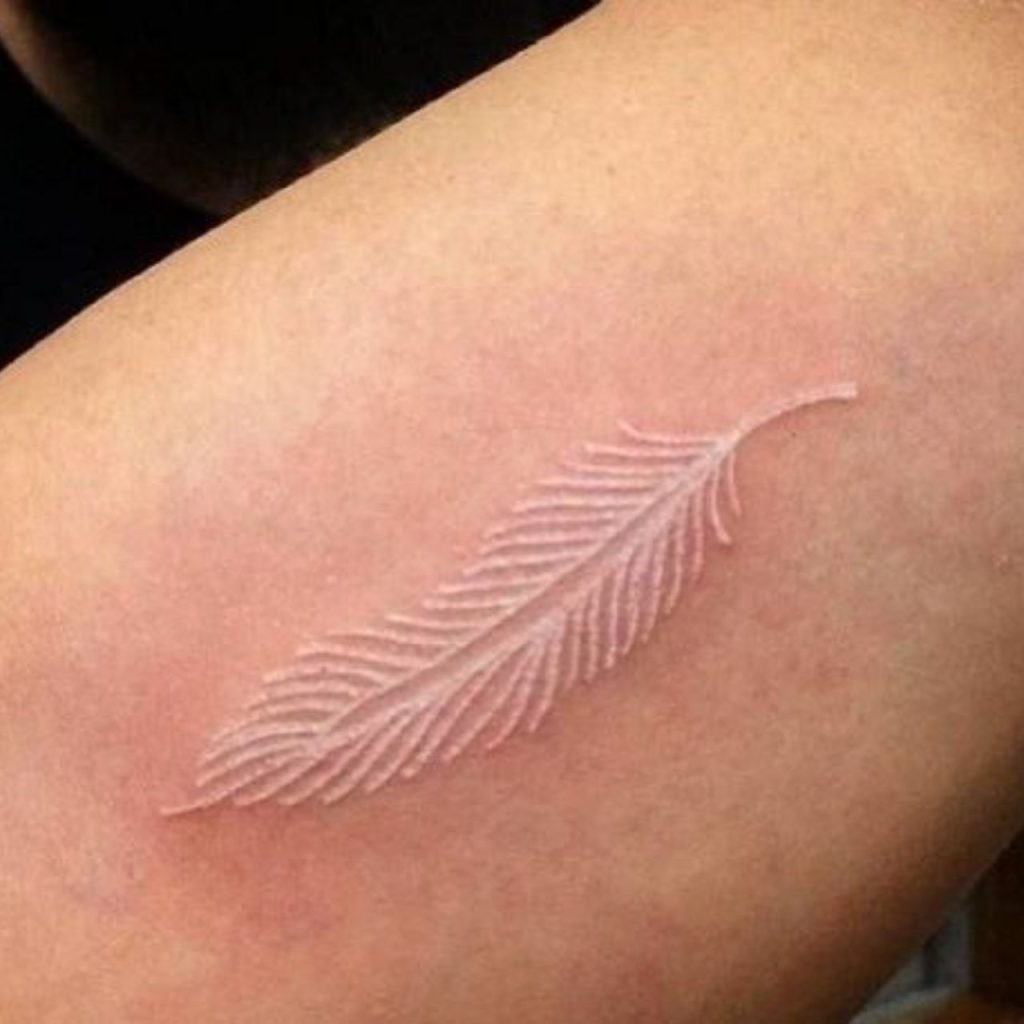Feather Tattoo in White Design