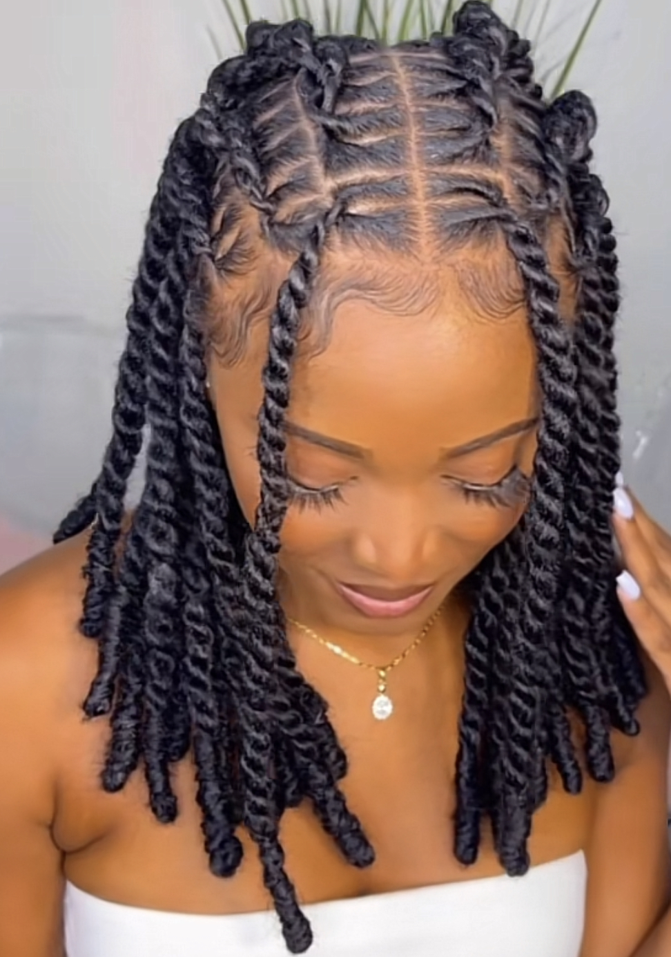 Invisible locs with a twist-out Hairstyle