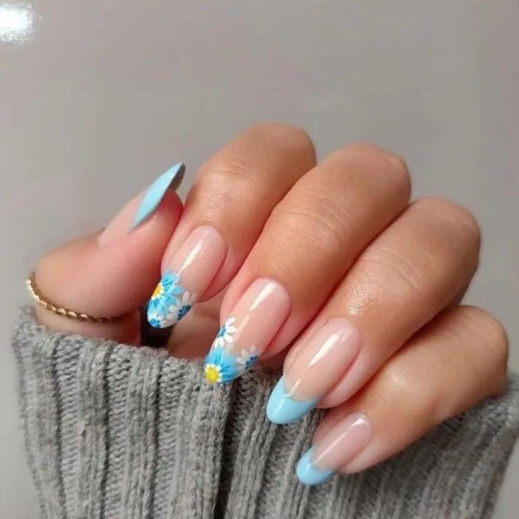 Sky Blue French Tip With A Silver And White Flower Accent