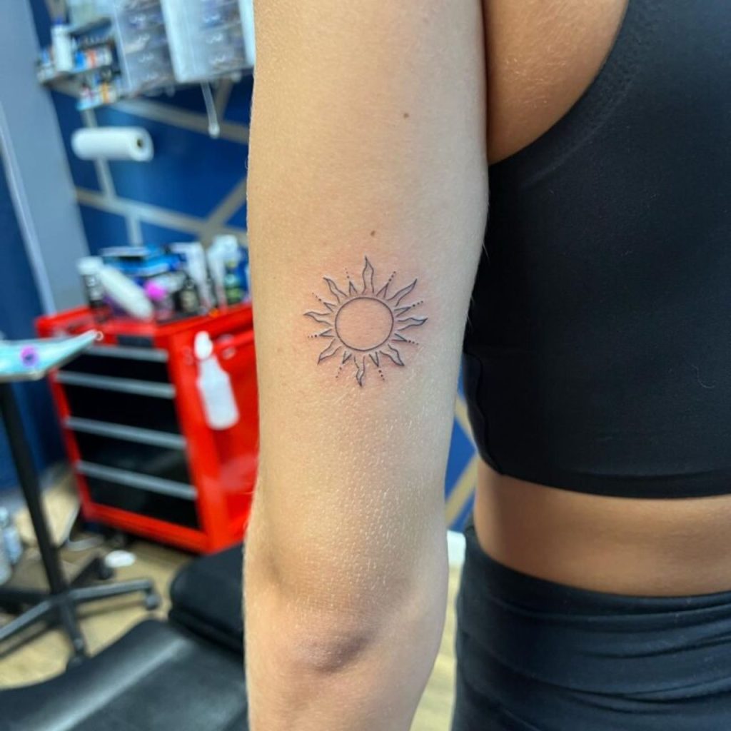 Sun Back of Arm Tattoo  