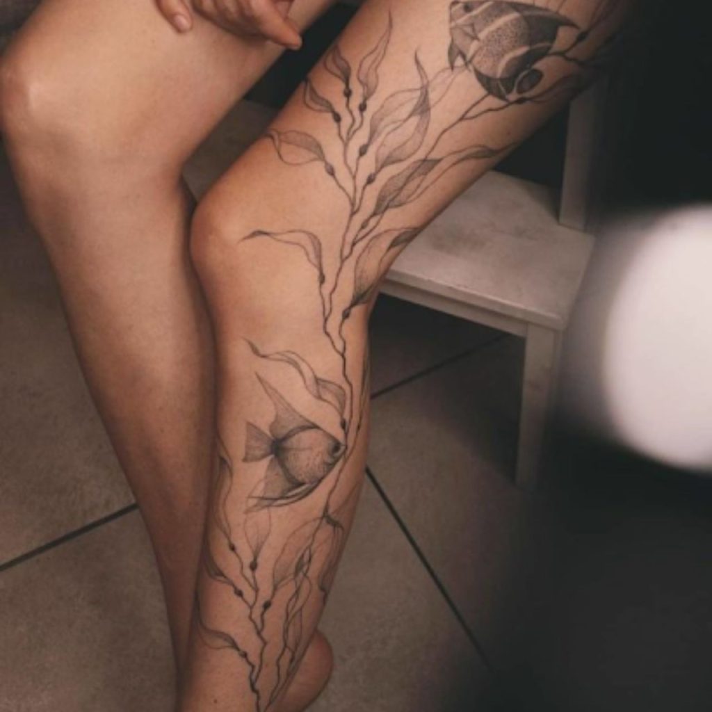 Aquatic Thigh Tattoos for women for bold look