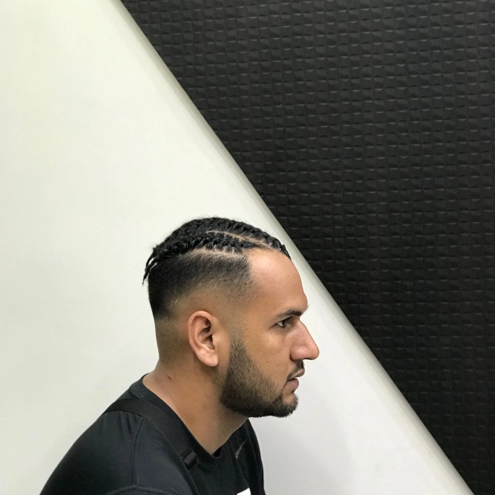 Drop Fade Haircut With Braids for a Dazzling Look
