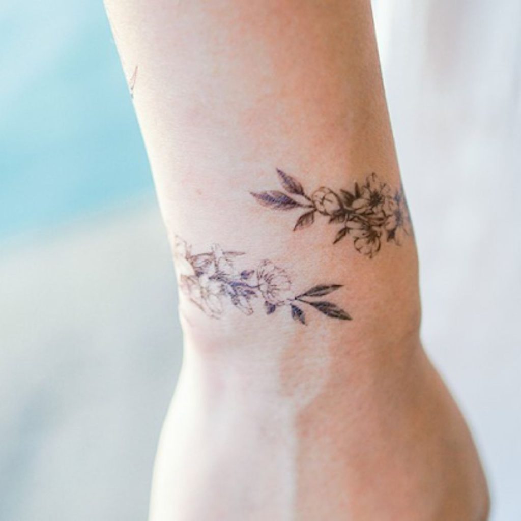 Flower with Petals Wrap Around Flower Wrist Tattoos