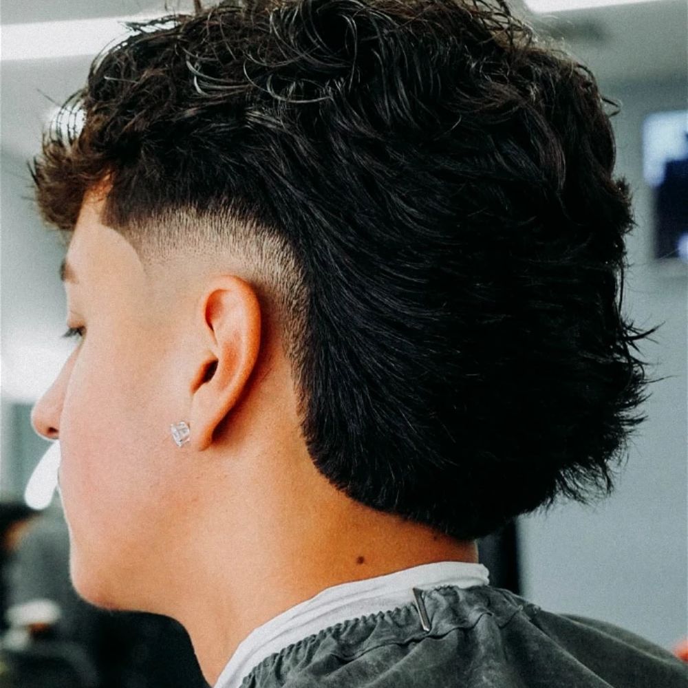 Low Burst Fade Mullet For A Chic Look