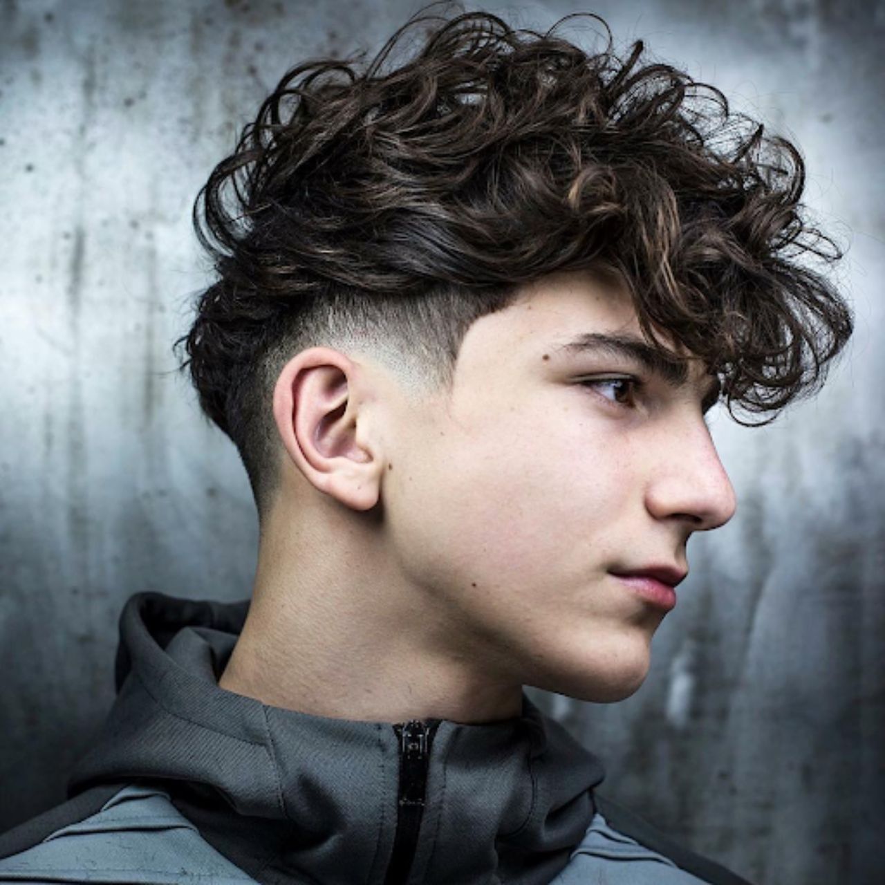 Messy Top Low Taper Haircut for Edgy Look