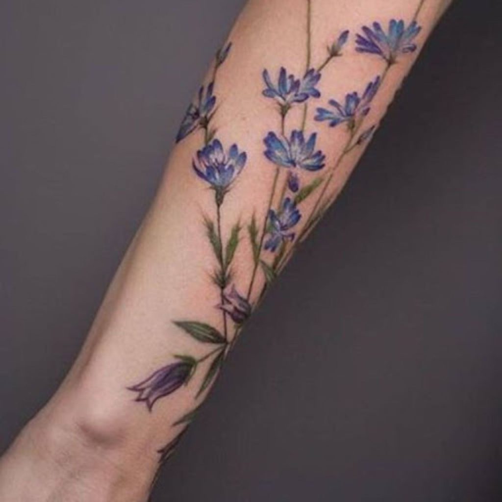 Blue and Lavender Wrap Around Flower Wrist Tattoos
