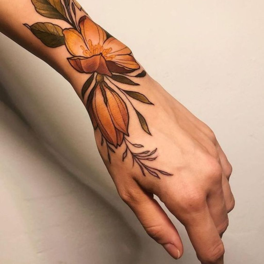 Sassy Brown Wrap Around Flower Wrist Tattoos