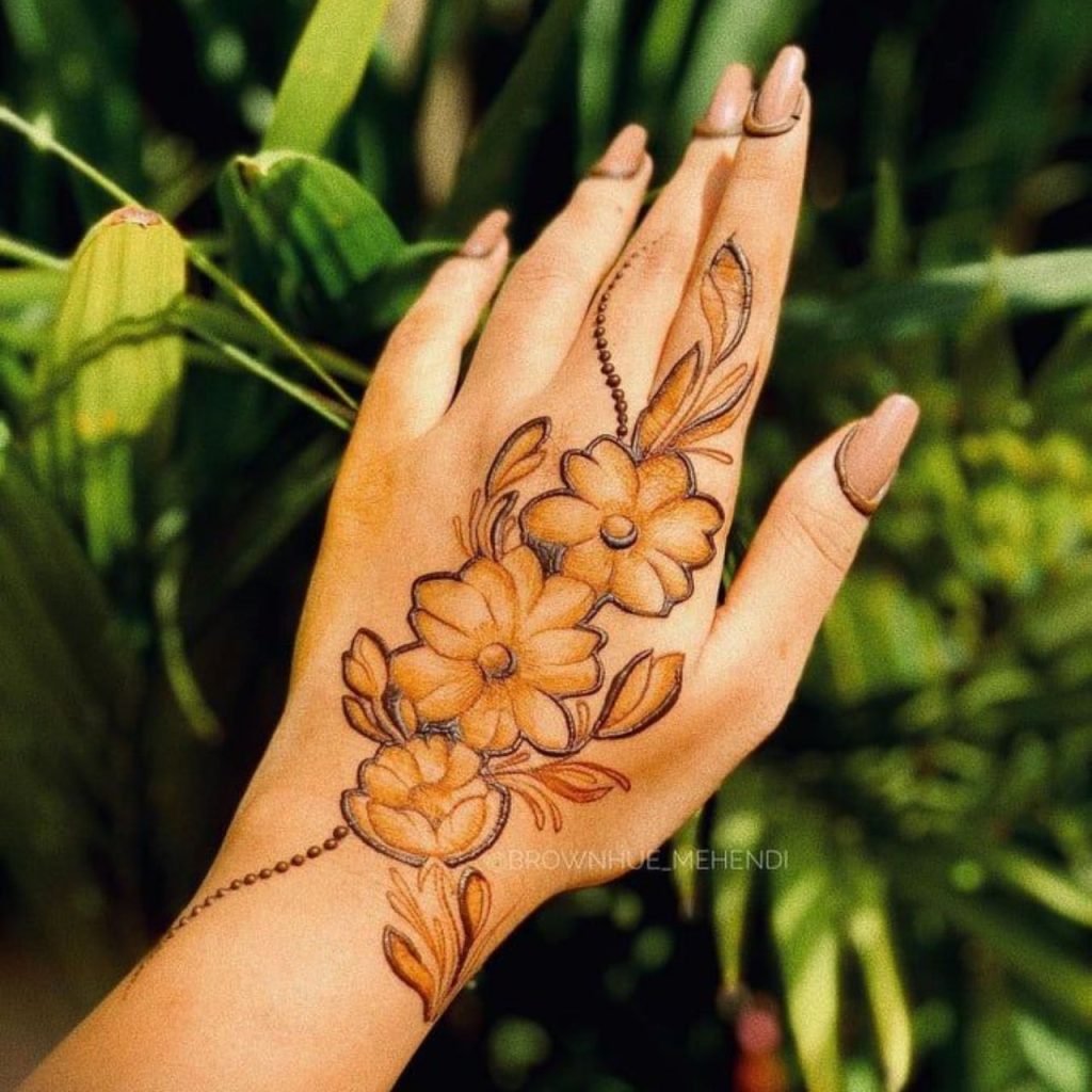 Flowered Tattoo Back Hand Mehndi Designs For Bridesmaids