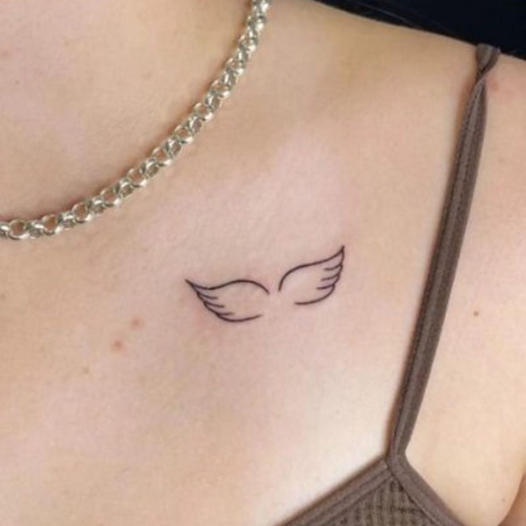 Angel Wings Tattoo on the front left shoulder