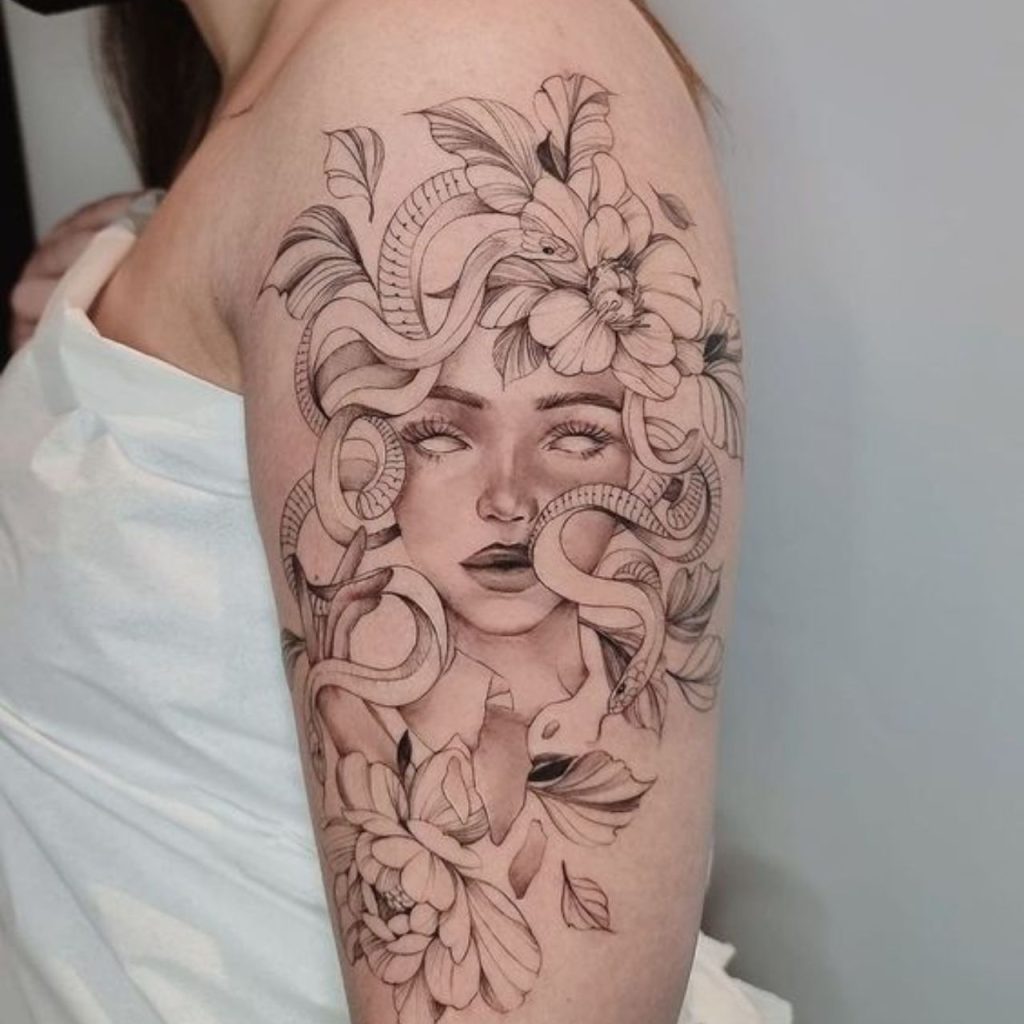 Medusa Tattoo on left arm of girl
