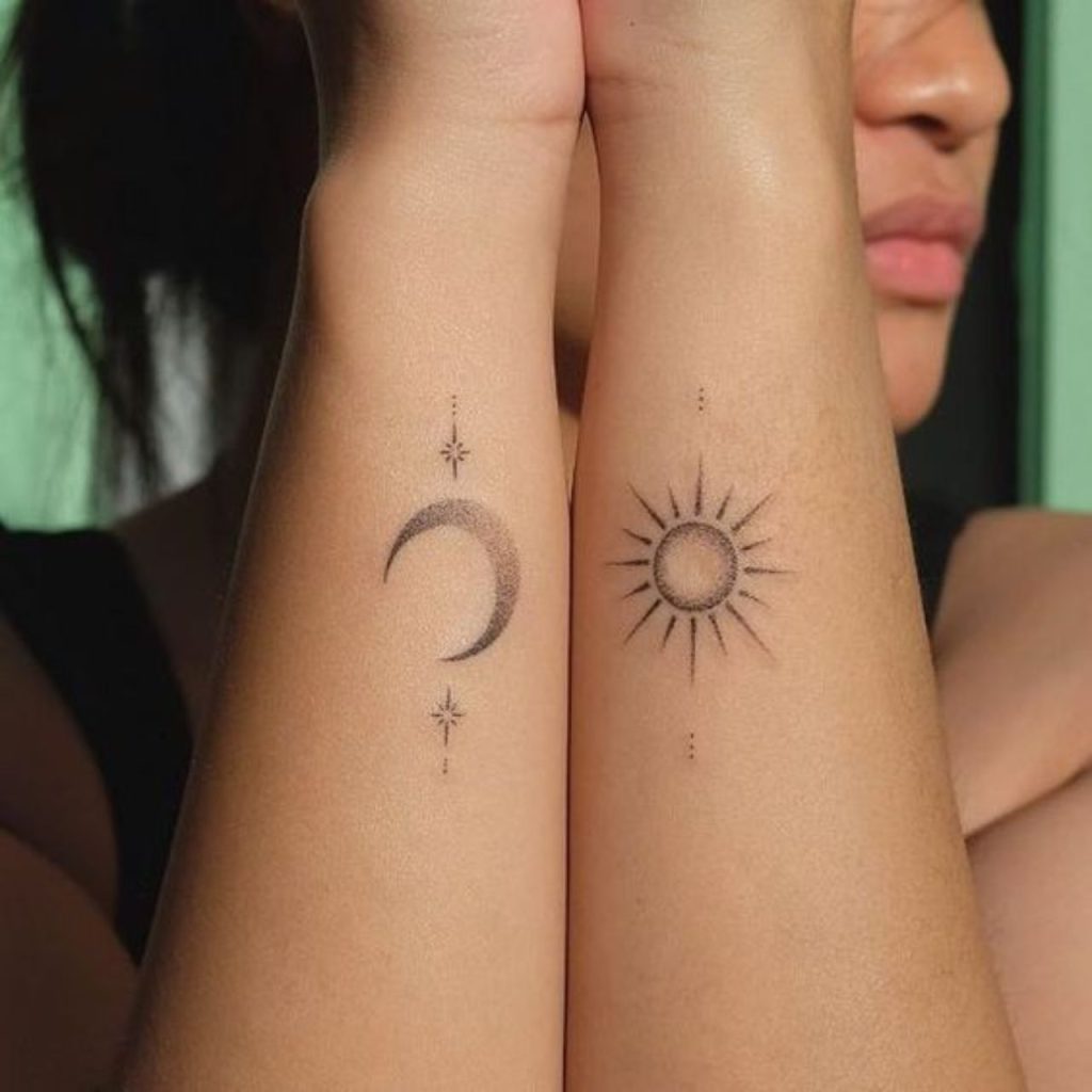 Sun on left arm and Moon on right arm female Tattoo
