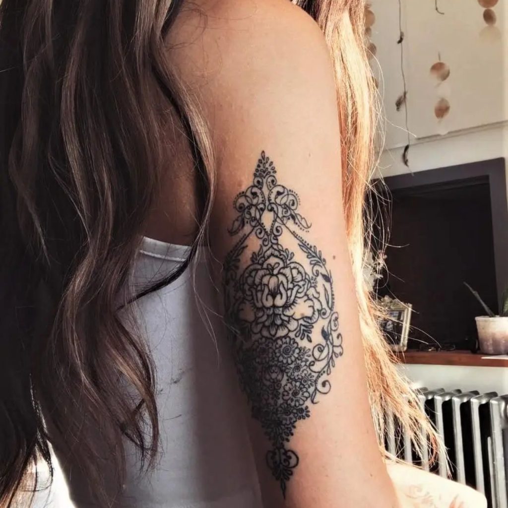 Sleeve Tattoo Designs for Females on the back of arm